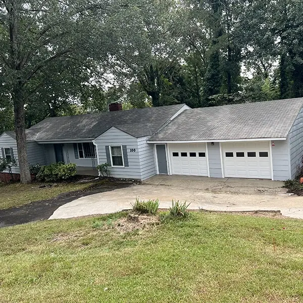 After: Roof And Concrete Pressure Washing
