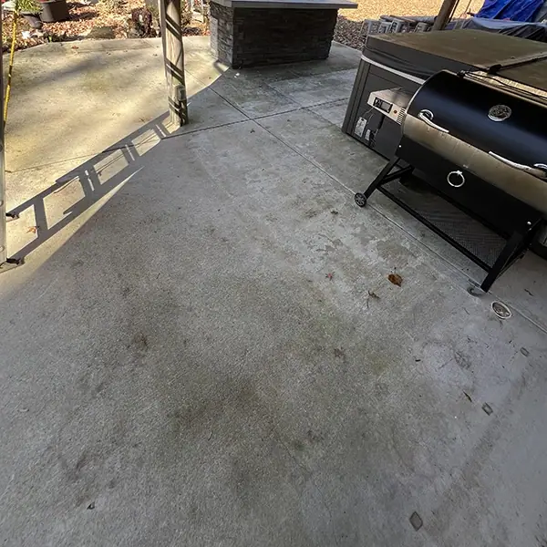 Before: Patio Before Concrete Pressure Washing